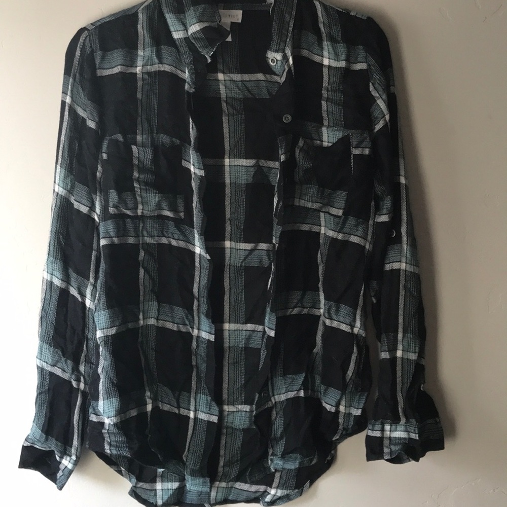 Black, teal, and white flannel